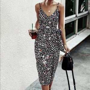 Black speckled wrap dress